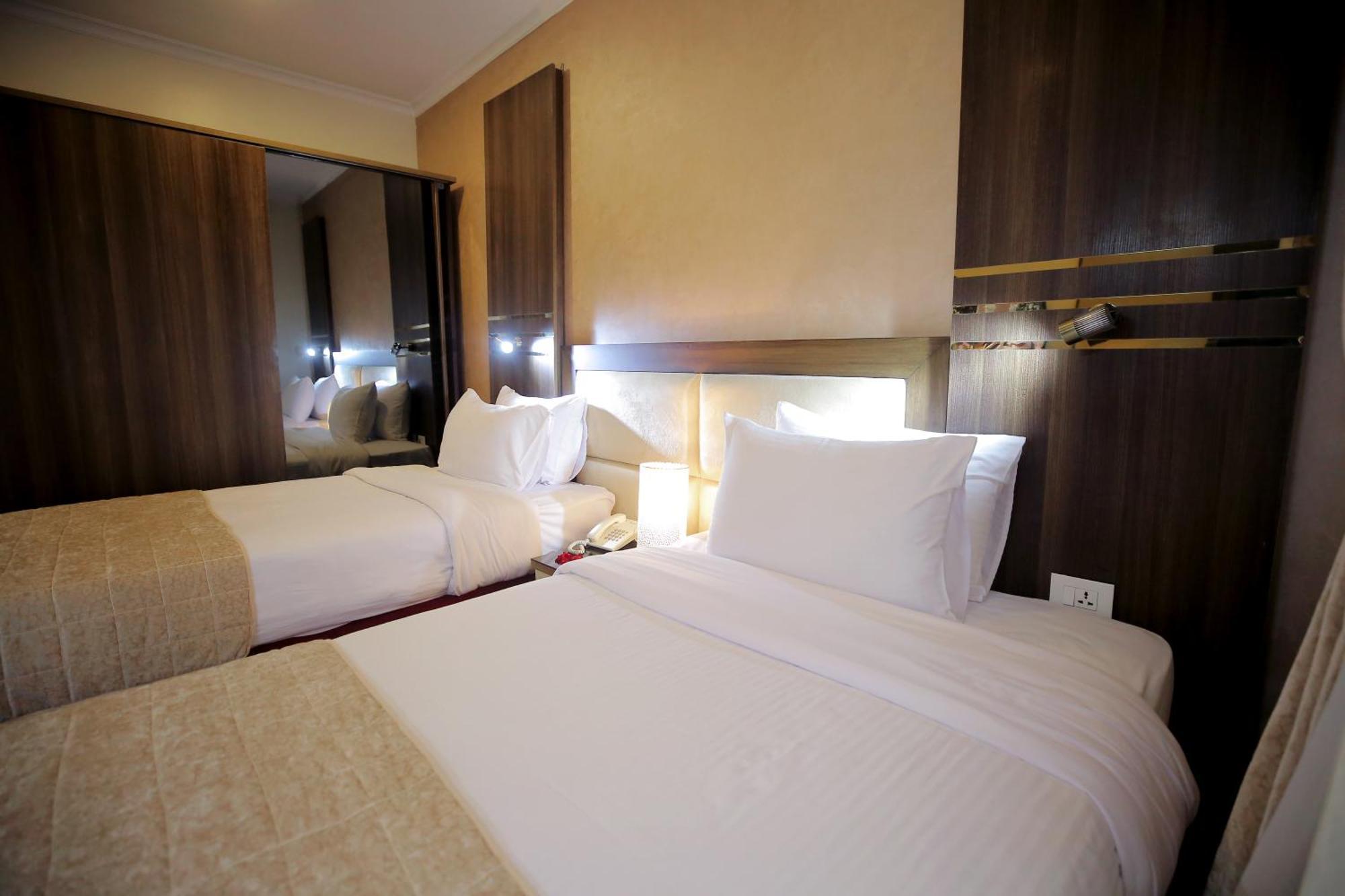 Cairo Taj Hotels & Suites - Dokki Bagian luar foto