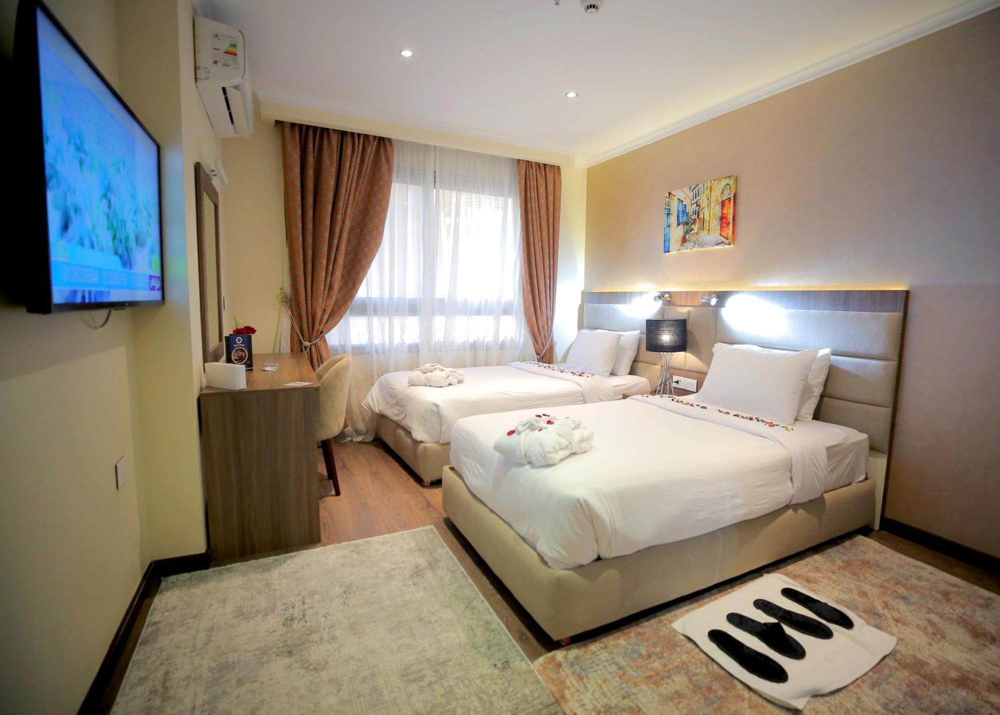 Cairo Taj Hotels & Suites - Dokki Bagian luar foto